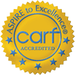 CARF Accredited seal with text "ASPIRE to Excellence" and "ACCREDITED
